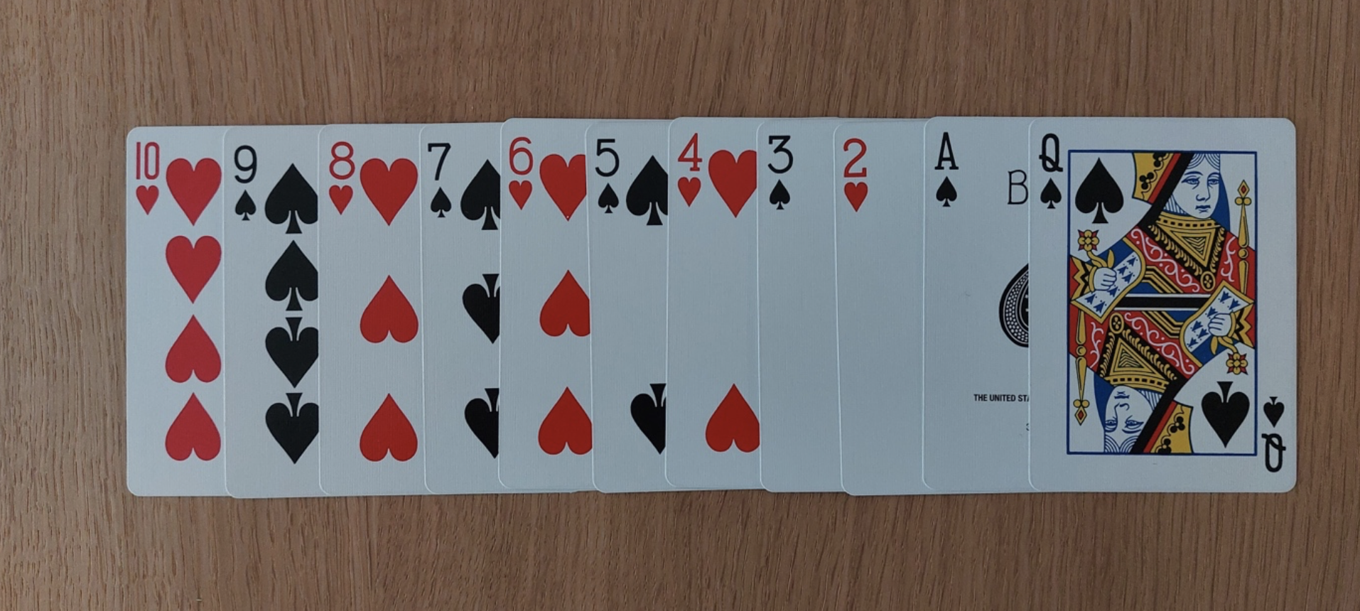 Playing cards: 10H, 9S, 8H, 7S, 6H, 5S, 4H, 3S, 2H, AS, QH