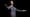 Magician Michael Carbonaro on stage smiling with arms open