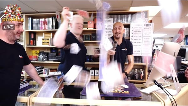 Dave Bonsall spraying cards at camera at propdog 