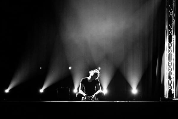 Magician Gaia Elisa Rossi sat on stage during rehearsals